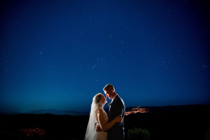 Bride and groom after dark portrait with the stars during their wedding day.