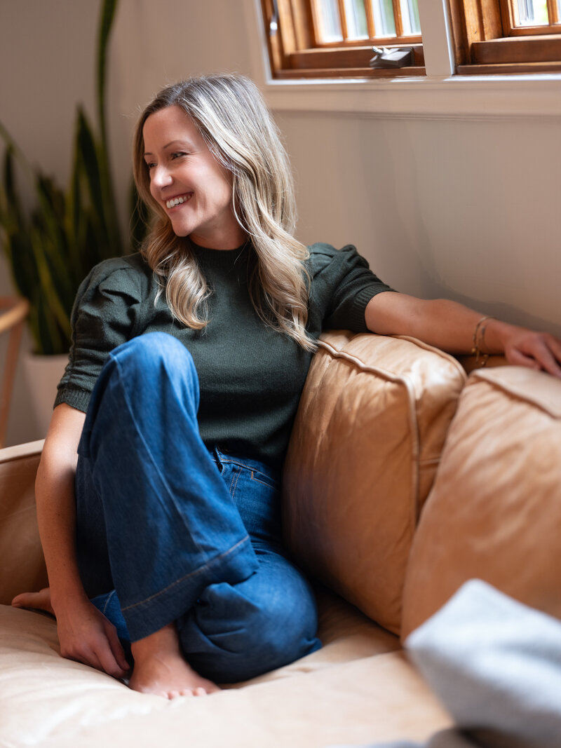 jen in her home embracing wellness