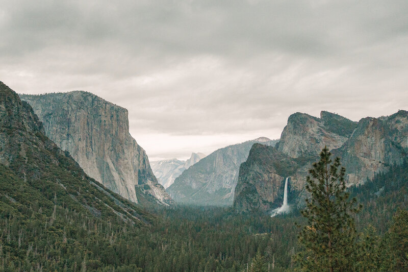 view from tunnelview at yosemite national park with waterfalls and half done