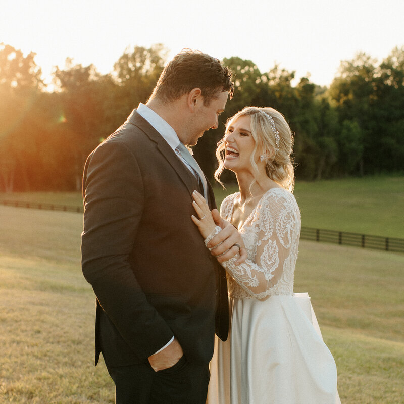 bride laughing at her groom during their summer Richmond wedding