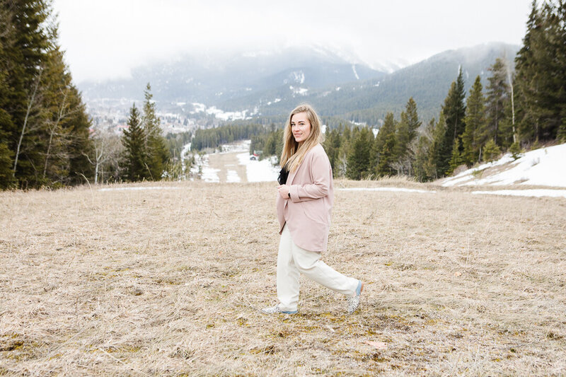 Realtor Tamara Rzan walking with the stunning mountain view of Bellevue