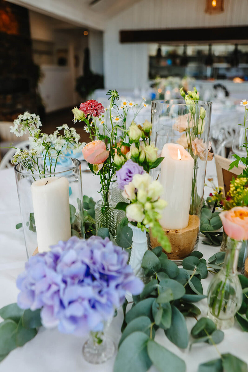 A wine glass sat on the table at Carbis Bay hotel for a wedding