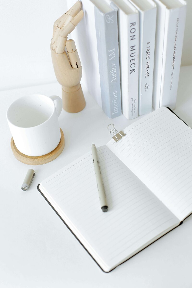 Blank notebook and pen for writing blog ideas