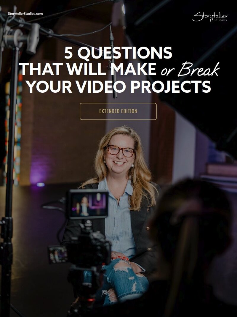 A behind-the-scenes image of a woman being interviewed on camera in a professional video production setup. The text overlay reads, “5 Questions That Will Make or Break Your Video Projects – Extended Edition,” with the Storyteller Studios logo in the top right corner.