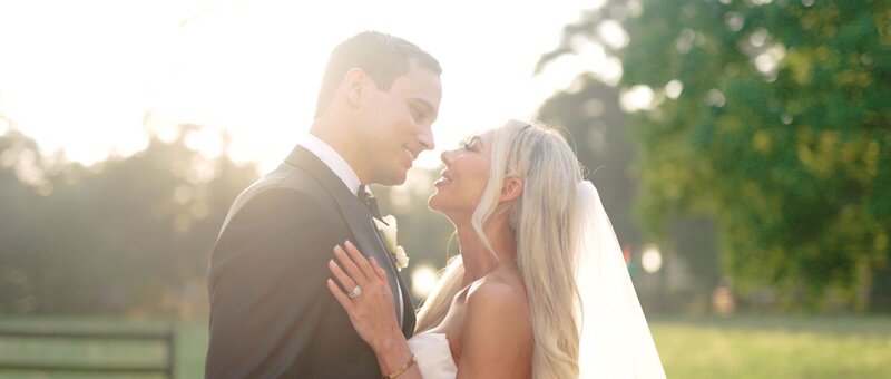 couple in dallas holding each other during sunset in dallas