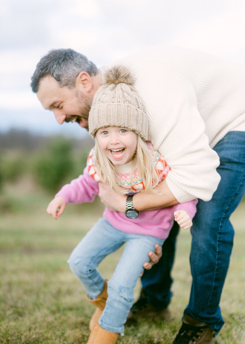 Father and daughter moment during a family portrait session.
