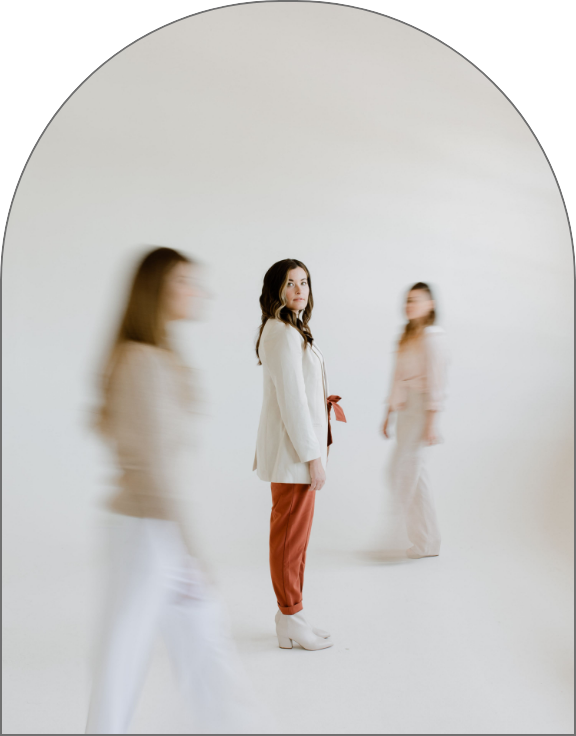Peak Interactive Wellness team members in Denver and Greenwood Village standing in a light-filled studio, representing the founding story and compassionate approach to mental health care.