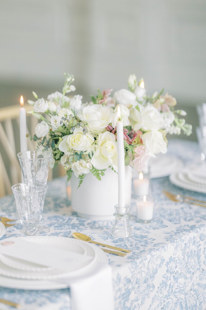 light blue and white wedding reception table setting