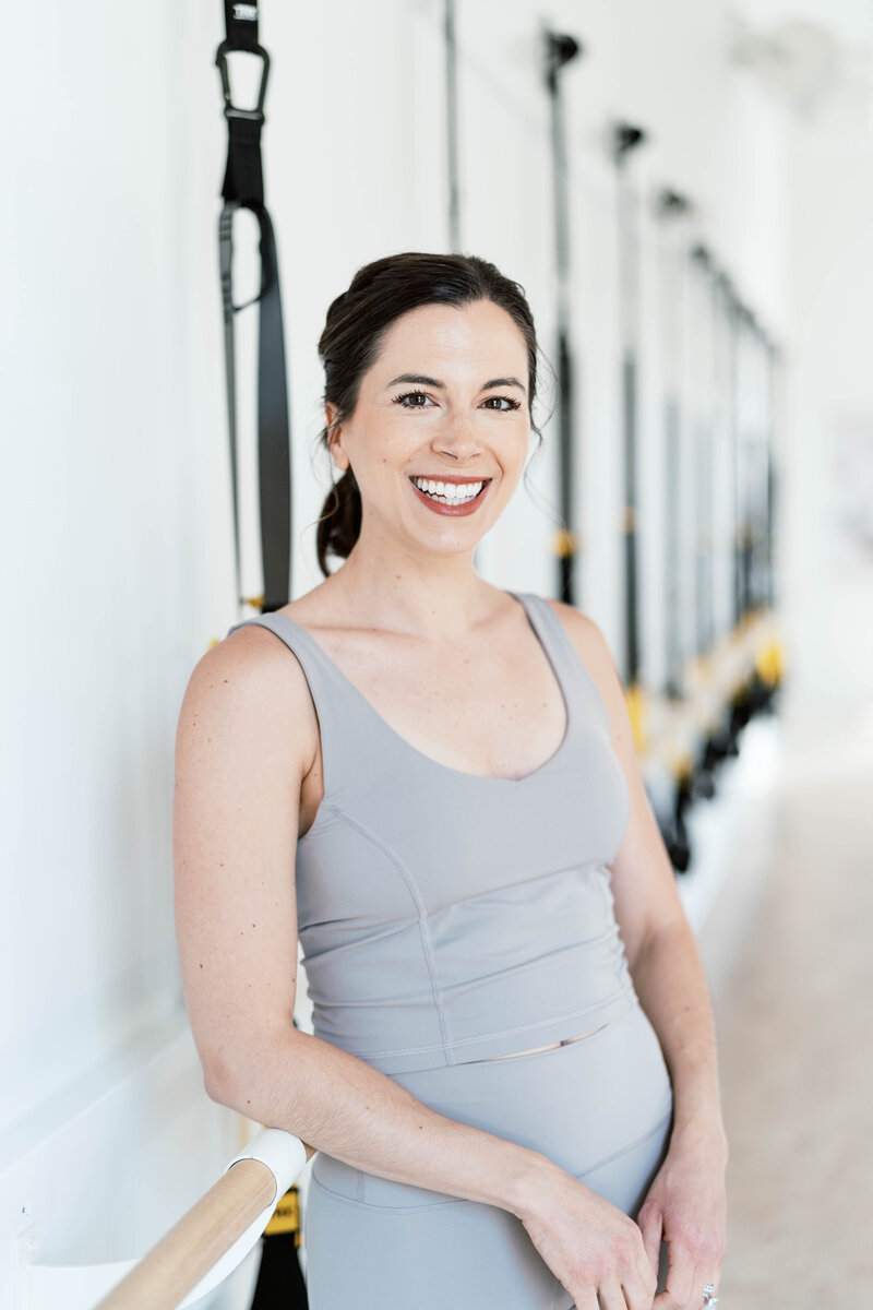 Kristi smiling in the studio