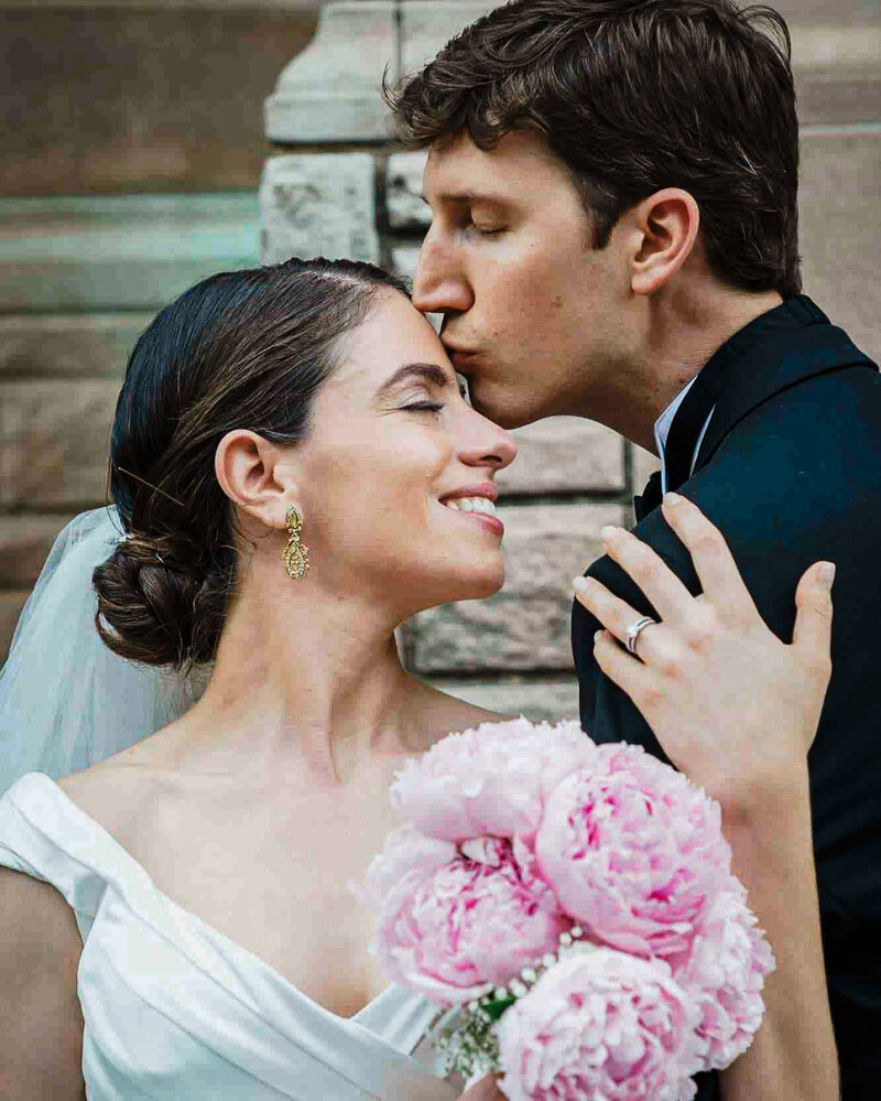 Bride and groom embrace after ceremony, wedding portrait captured by Alex Kaplan Photography in New Jersey