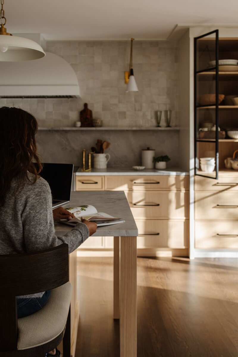Mom starting her day in a calm, functional, and beautifully designed kitchen