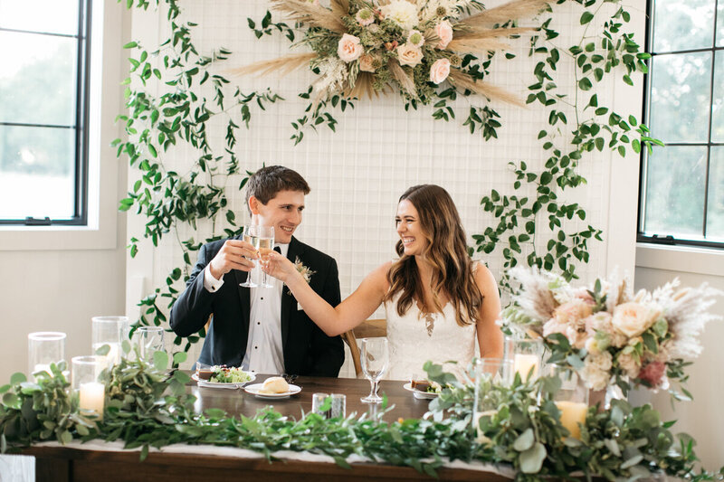 Central PA wedding couple at sweetheart table during reception at Hazelwood