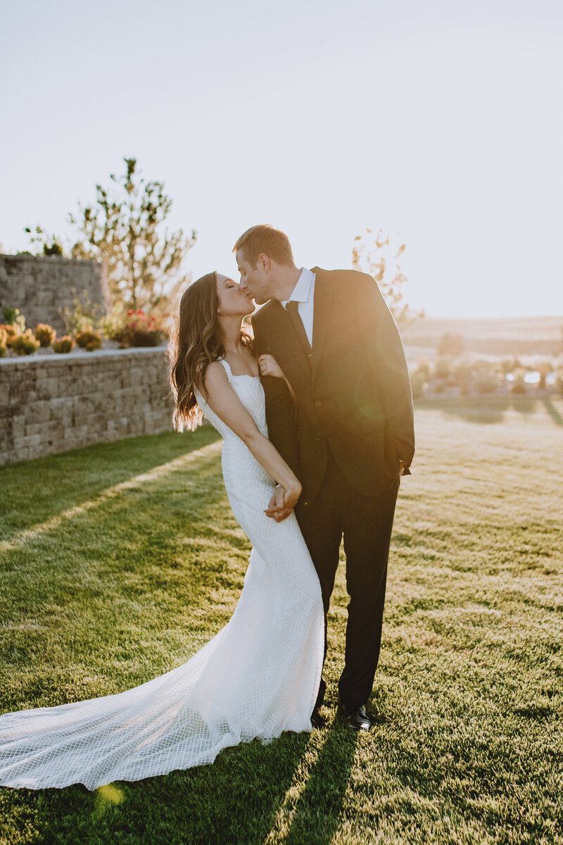 bride and groom kiss