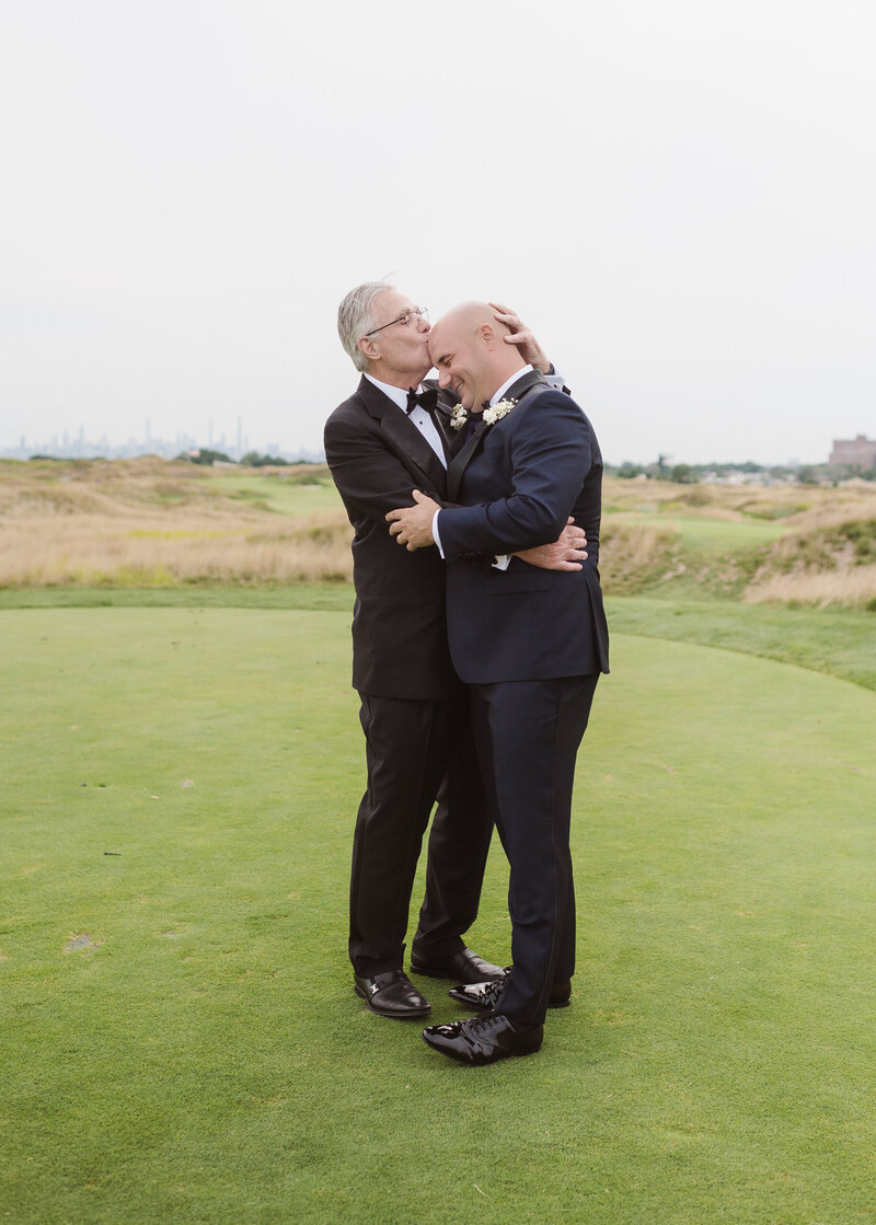 father of bride funny moment kissing grooms bald head