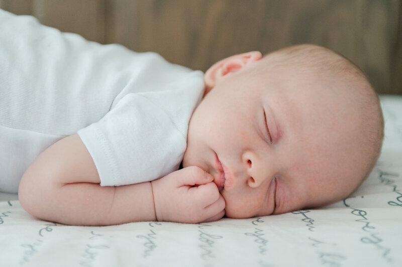 newborn baby boy sleeping during session with york pa photographer