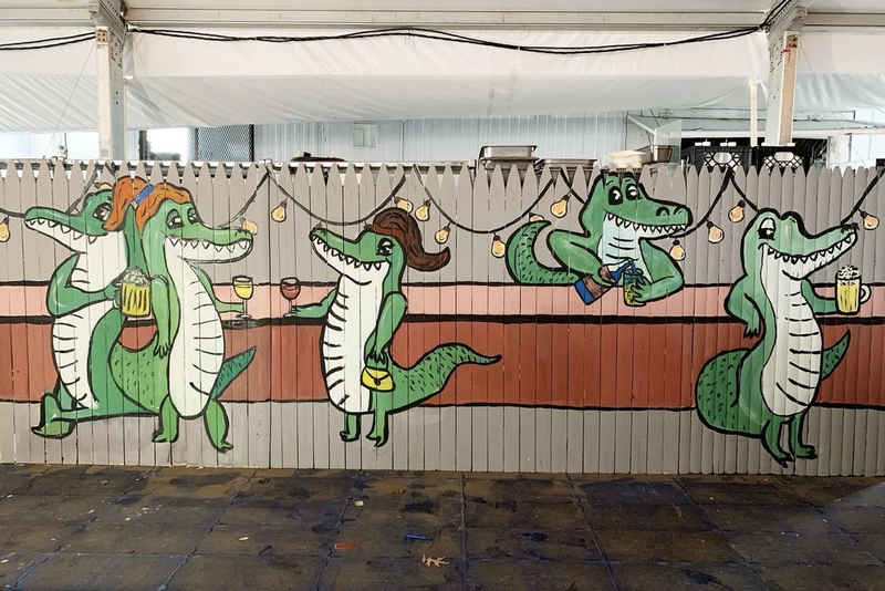 mural of alligators at bar