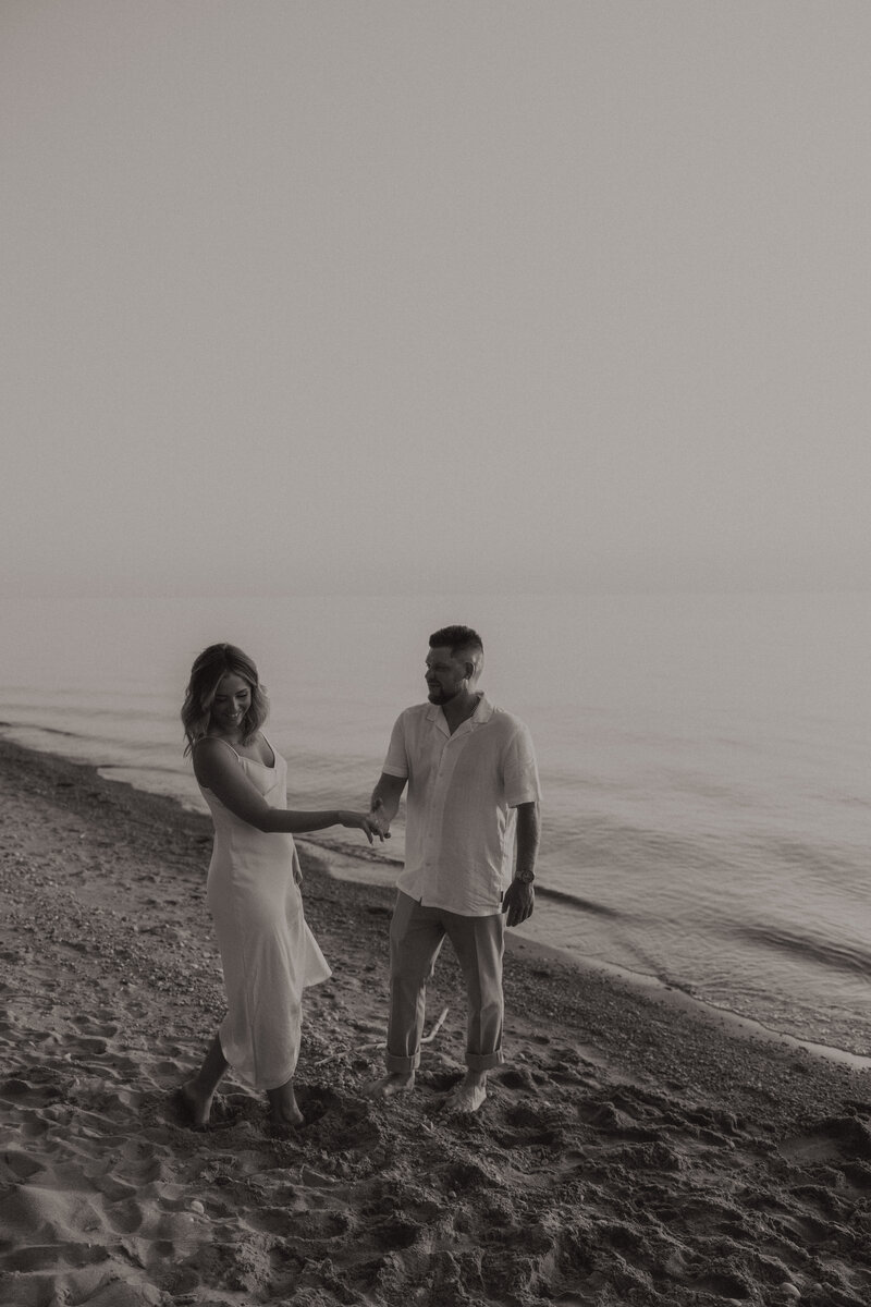 Romantic couples photos taken by Ontario-based photographer Sarah Todd, capturing love in a scenic outdoor setting