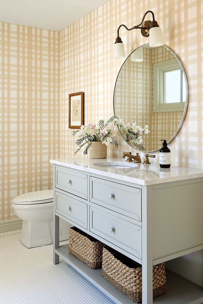 Textured wallpaper and warm wood tones in an Orange County home redesign
