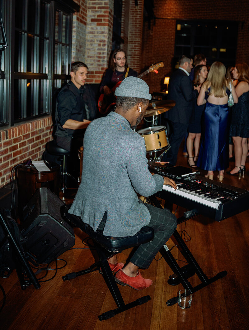 Burgundy and green modern welcome party and rehearsal dinner at Ritz-Carlton Georgetown DC