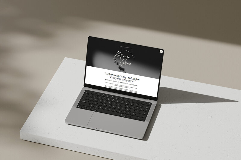 Laptop showcasing custom salon website strategy by Ruby Works Co.™ designed to increase bookings and organic search traffic.