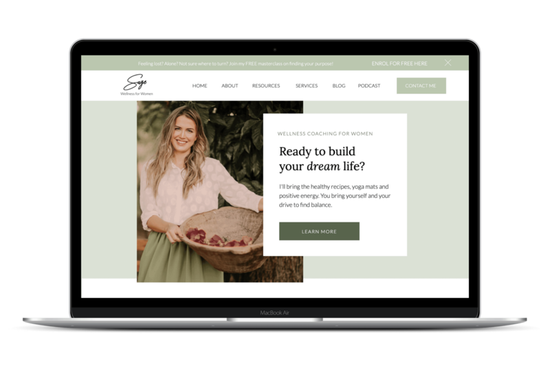 A macbook showing the home page of a wellness coach Showit website template