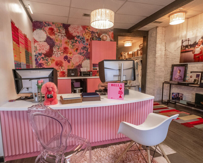 A look into the pink front reception desk at the photo studio