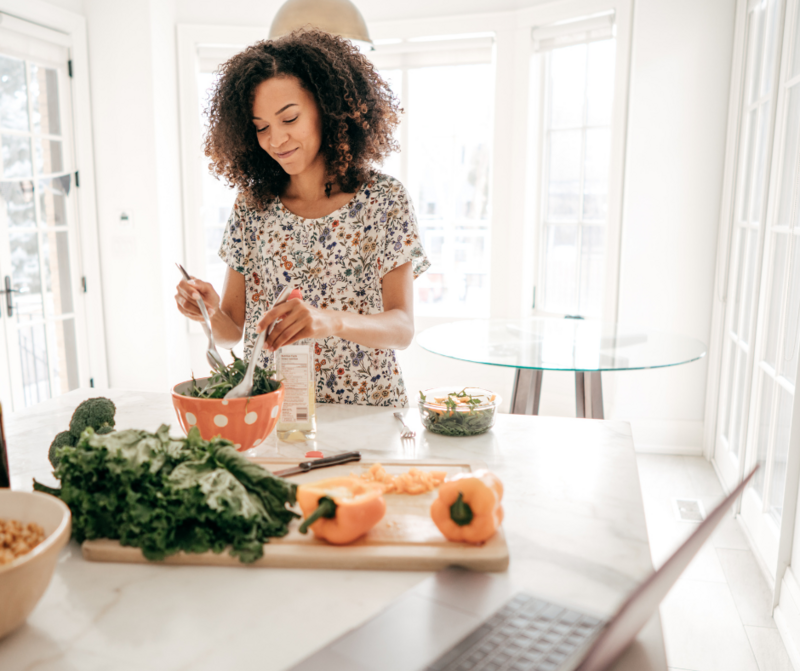 Woman preparing healthy food and vegetables
