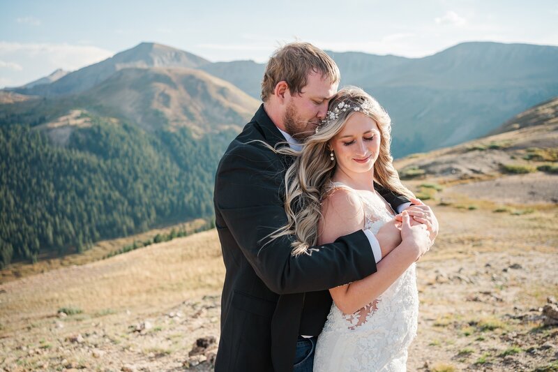 Samantha Immer's mountain wedding experience combines adventure and romance for a truly unforgettable day in the Colorado mountains. With a focus on your unique love story, she'll create stunning photos that reflect your personalities and style.