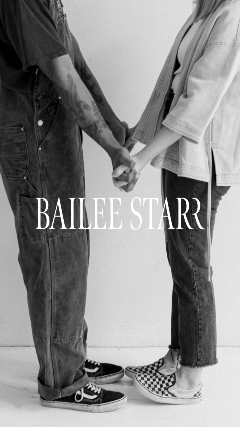 Bailee Starr logo on top of a black and white image of two people holding hands