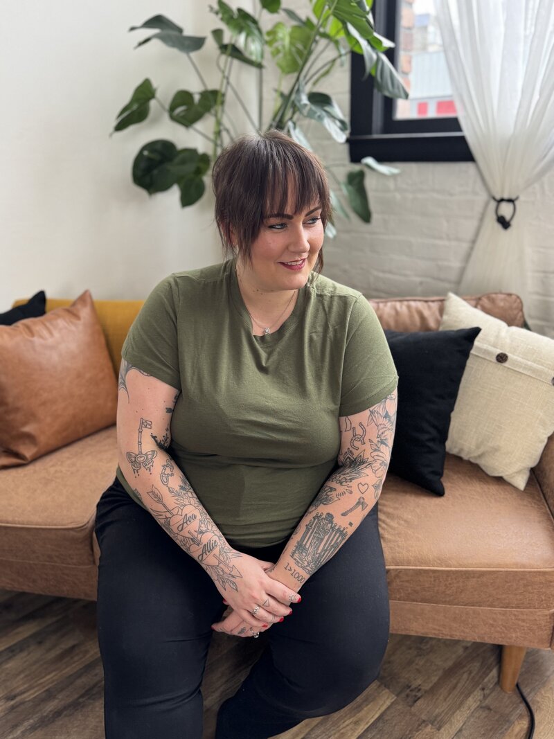 Business owner smiling while reviewing their new website design
