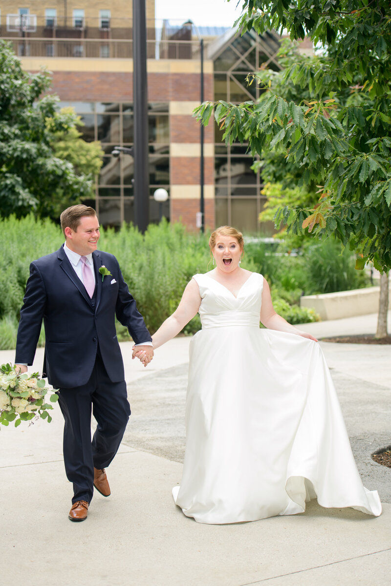 Bride and Groom Portrait with navy suit and ivory wedding dress