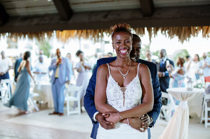 A skilled wedding photographer documenting a stunning destination wedding filled with joy and romance.