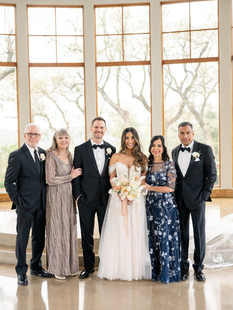 Family portraits at Canyonwood Ridge with Hill Country backdrop