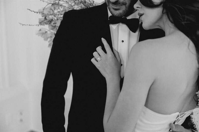 black and white close up of bride and groom
