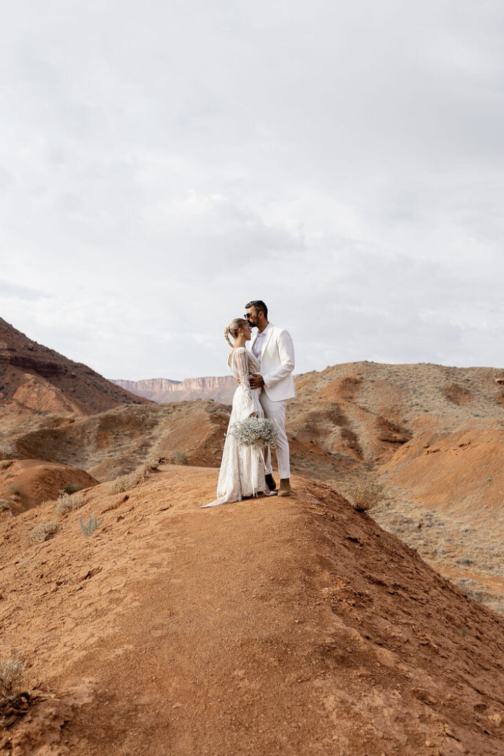 Couple just married on the dunes of moab