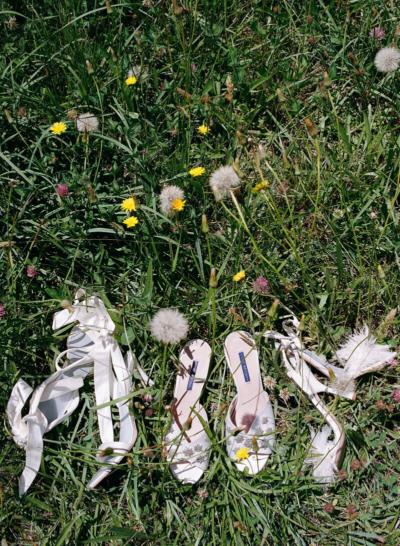 Rhode Island wedding photograph of wedding shoes in grass