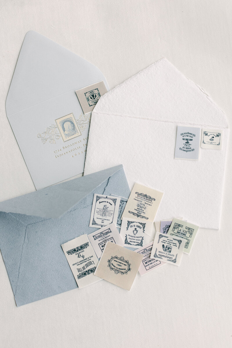 Linen-wrapped stamps adding texture and interest to flat lay compositions