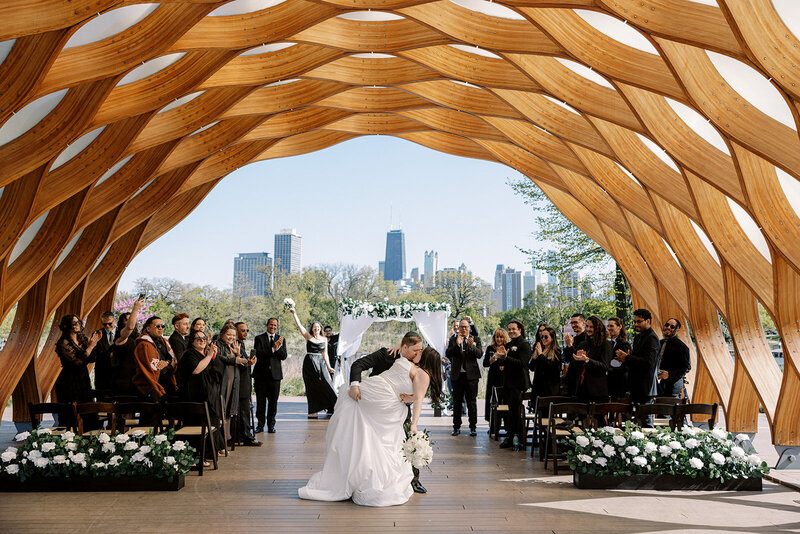 Outdoor wedding ceremony at the Honeycomb in Lincoln Park Nature Boardwalk, photographed by Chicago wedding photographer Abe Fernandez in a candid, documentary style using film and digital