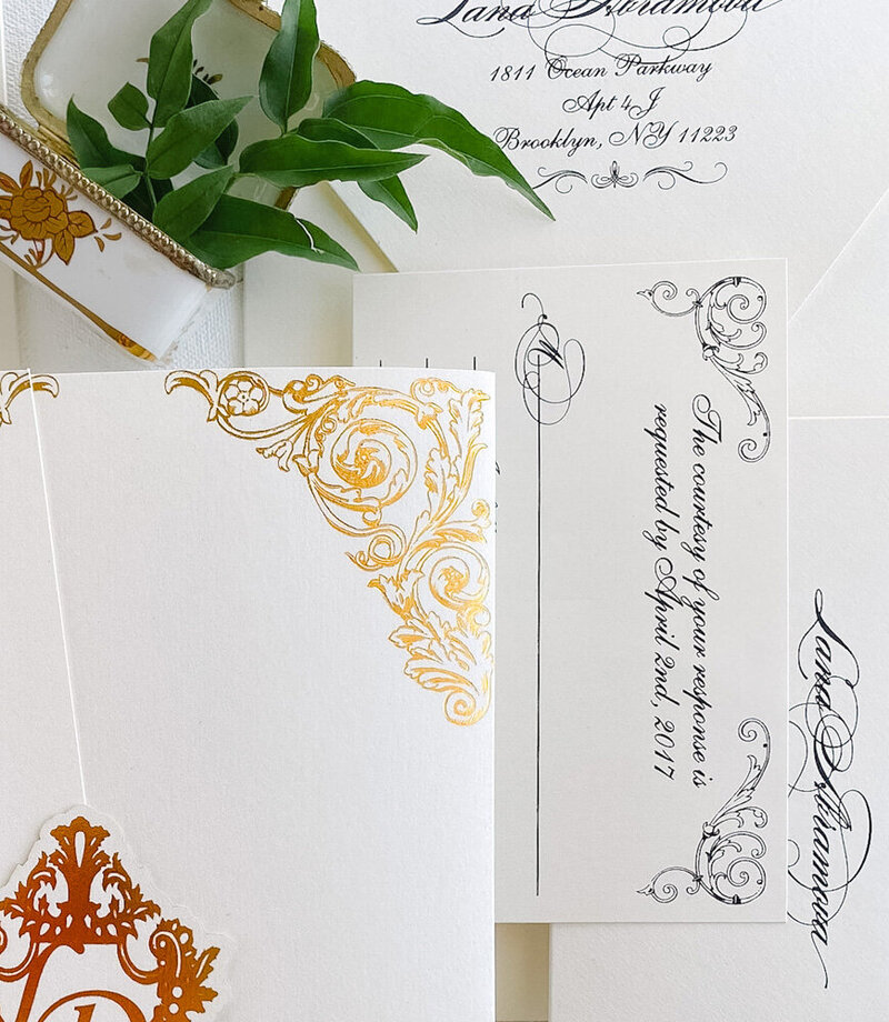 Gold foil pocketfolder wedding invitation detail