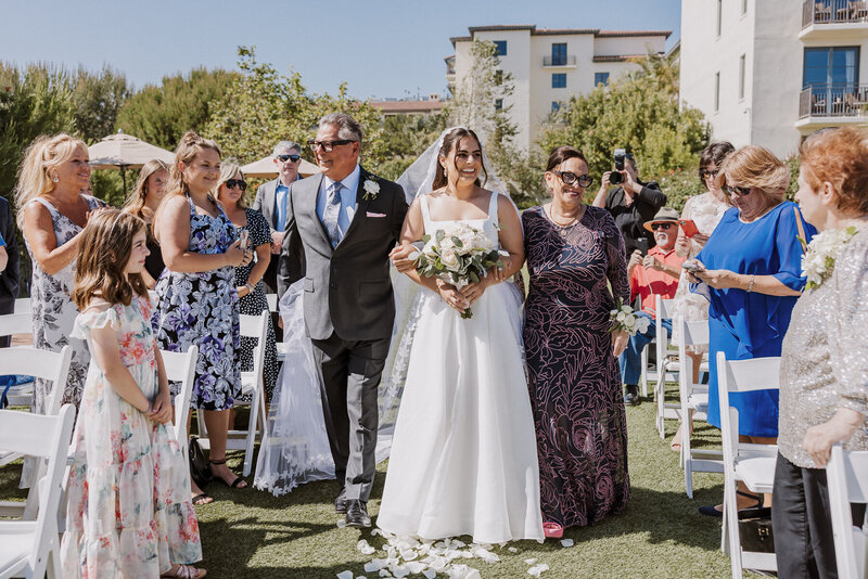 terranea wedding photographer palos verdes editorial bride and parents down ceremony aisle catalina point
