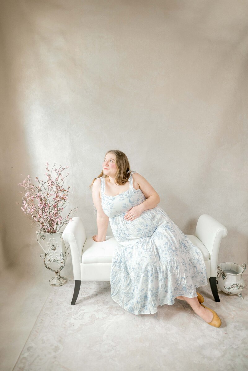 Expecting mother posing in seattle studio