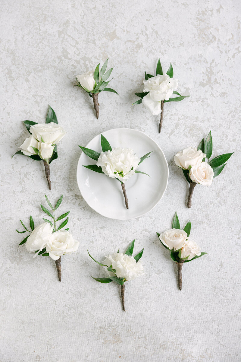 flat lay of white roses