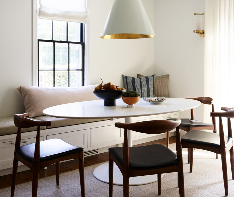 Interior Designers in Boston creating complete home interiors—from space planning to kitchen and bath design to furniture—featuring a casual dining room in a historic Hingham home.