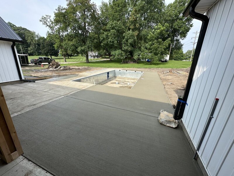 Covered patio slab poured to tie into a new pool deck