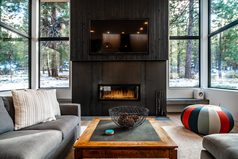 modern-mountain-fireplace-steel-blackened-wood