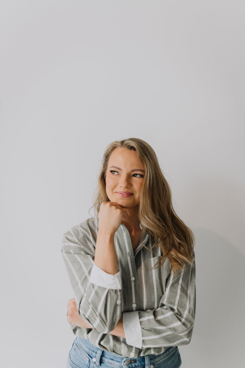 Headshot of Megan Evans in front of a white wall
