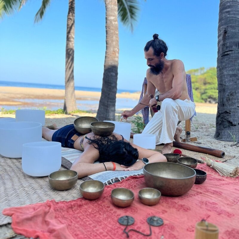 Guillermo Blanco, a bilingual Mexican sound healer in Sayulita, guiding transformative experiences through ancestral instruments, meditation, breathwork, cacao ceremonies, and Temazcal.