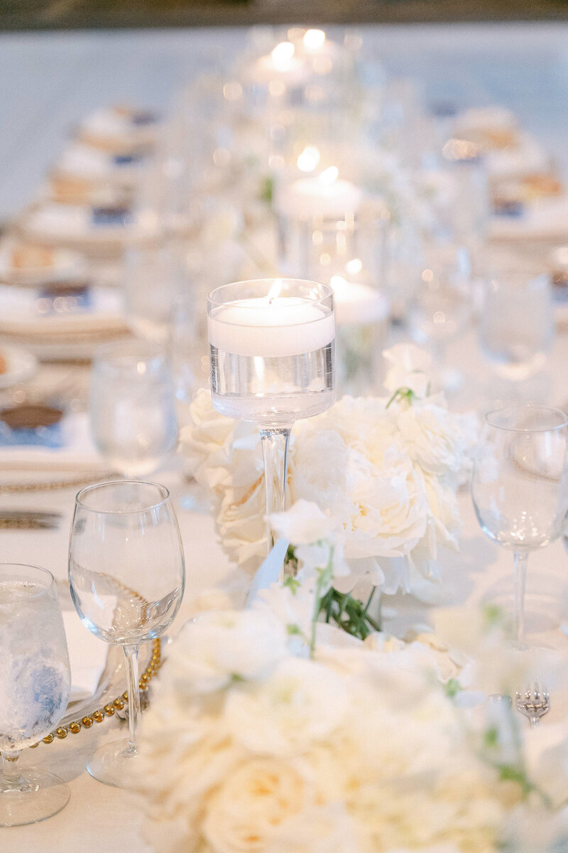 Candles and Flowers as centerpieces at a wedding reception