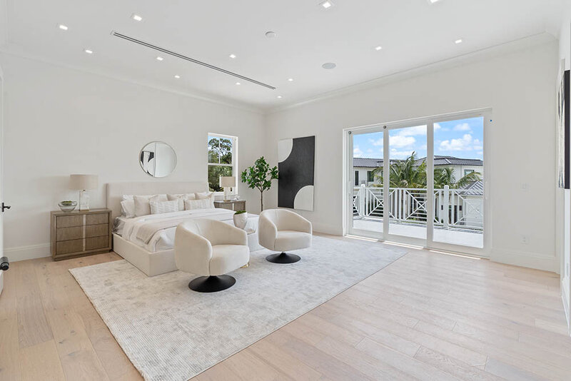 Modern Coastal Master Bedroom Waterfront Home in Jupiter Florida
