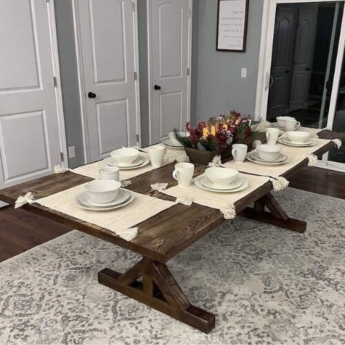 The finished Farmhouse-Style Dining Table complete with table settings